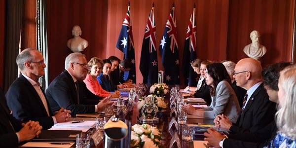 New Zealand Prime Minister Jacinda Ardern with her Australian counterpart Scott Morrison and staff. (Photo: Penny Bradfield/Auspic)