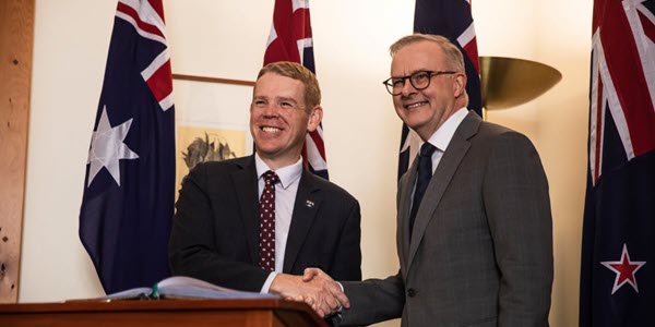 New Zealand Prime Minister Chris Hipkins shakes hands with his Australian counterpart Anthony Albanese. (Photo: RNZ/Samuel Rillstone)