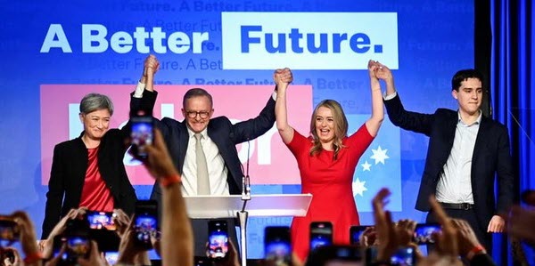 The Australian Labor Party will form government. Pictured on election night are Senator Penny Wong, Prime Minister in-waiting Anthony Albanese, his partner Jodie Haydon and son Nathan Albanese. Photo: Jami Joy, Reuters
